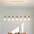 Contemporary Nordic Iron Long Strip Glass Magic Bean 5/7-Light Island Light Chandelier For Dining Room