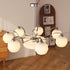 Modern Mid-Century Branch Curved Rod Round Orb Iron Glass 4/6/8 Light Chandelier For Living Room