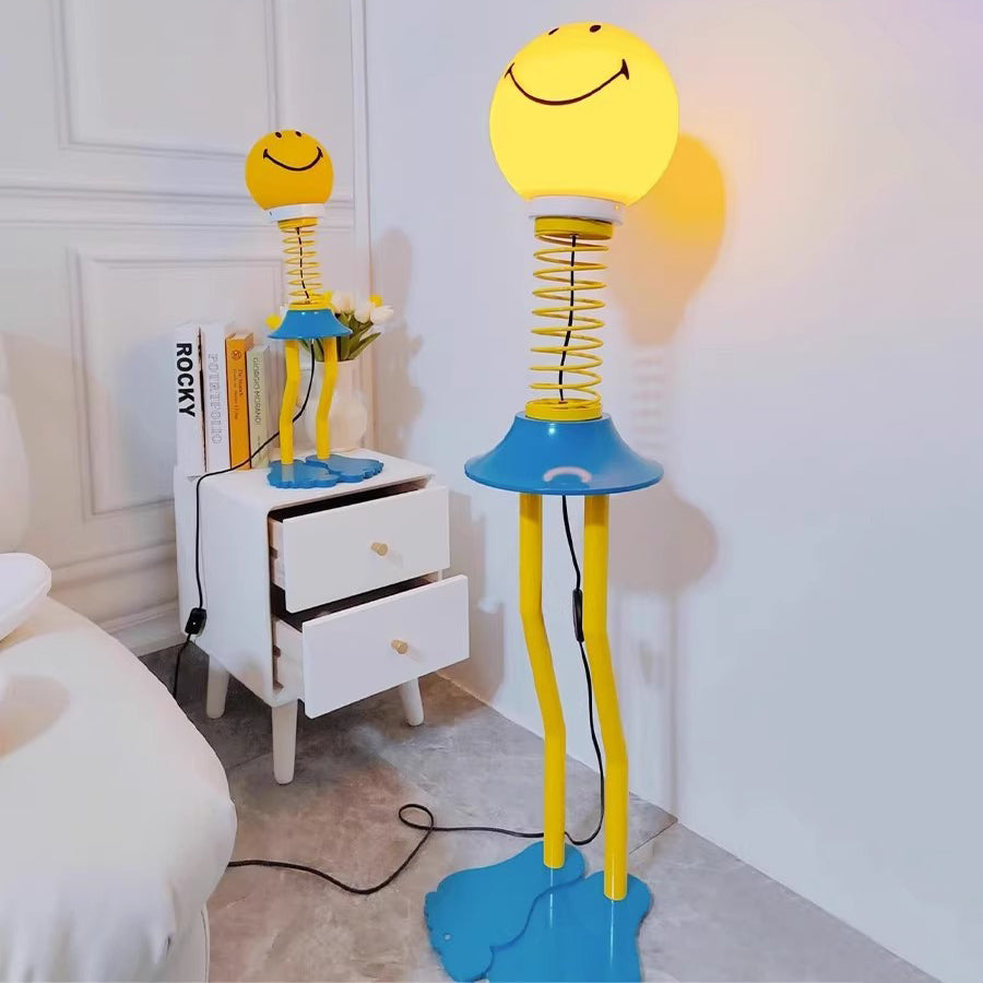 Contemporary Creative PVC Iron Smile Cartoon Character 1-Light Standing Floor Lamp For Living Room