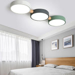 Contemporary Scandinavian Macaron Iron Geometric Round Shade Wood Splicing LED Flush Mount Ceiling Light For Bedroom