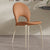 Contemporary Nordic Round Faux Leather Upholstered Carbon Steel Legs Dining Chair Backrest Armless For Dining Room