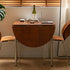Modern Minimalist Foldable Oval Melamine Faced Board Wood Stainless Steel Dining Table For 4 Seats