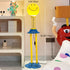 Contemporary Creative PVC Iron Smile Cartoon Character 1-Light Standing Floor Lamp For Living Room