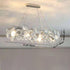 Modern Luxury Tiered Crystal Disc Round Shade Stainless Steel 8/12-Light Chandelier For Living Room