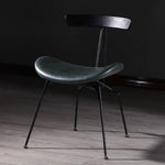 Contemporary Luxury PU Leather Upholstered Metal Legs Curved Dining Chair Backrest For Dining Room