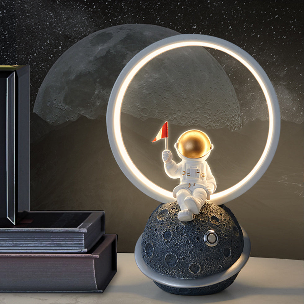 Contemporary Creative Resin Cartoon Astronaut Planet Iron Ring LED Kids Table Lamp For Bedroom