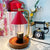 Contemporary Creative Iron Conical Shade Wooden Base 1-Light Melting Wax Table Lamp For Bedroom