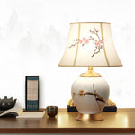 Traditional Chinese Plum Flower Embroidered Fabric Shade Ceramic Base 1-Light Table Lamp For Bedroom