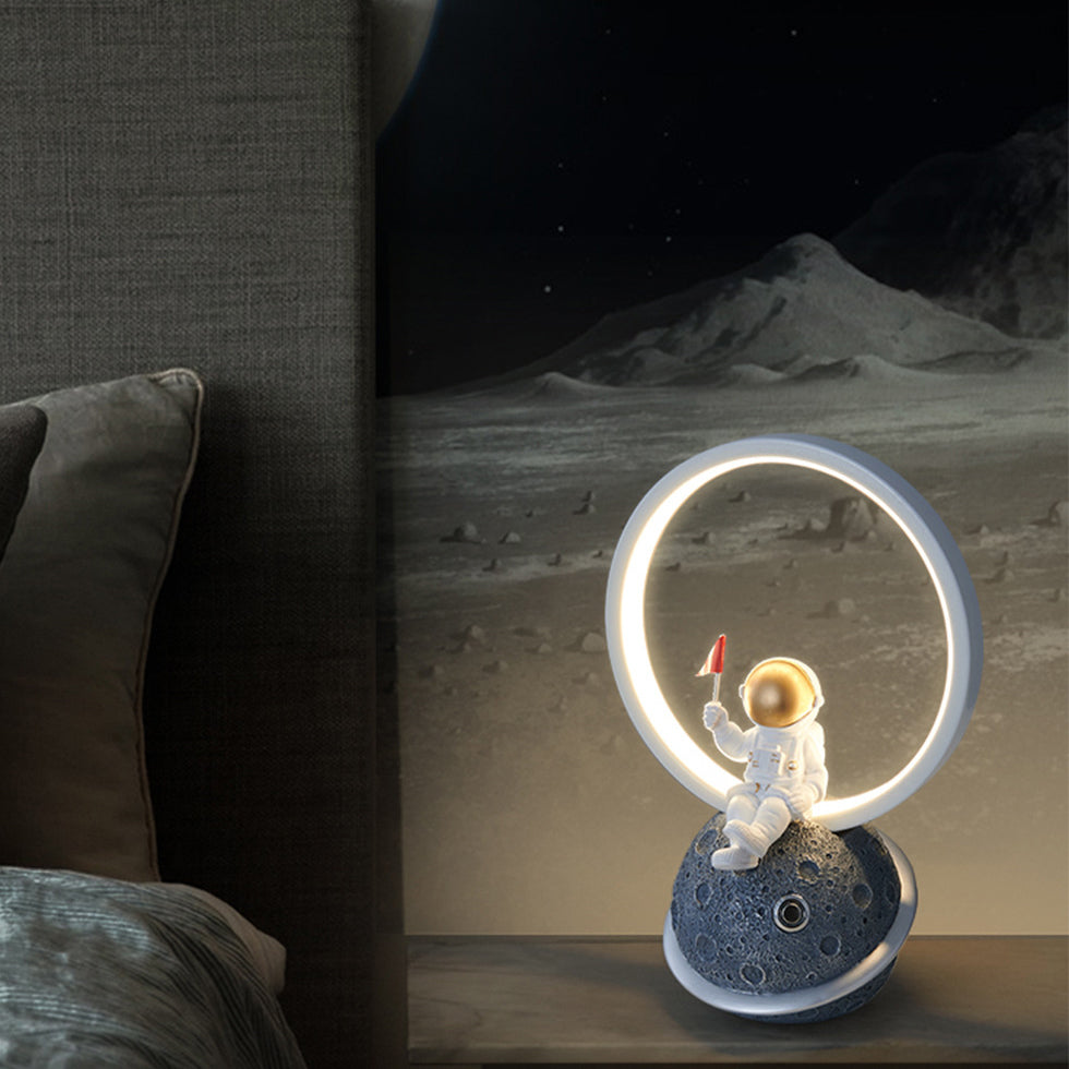 Contemporary Creative Resin Cartoon Astronaut Planet Iron Ring LED Kids Table Lamp For Bedroom