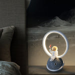 Contemporary Creative Resin Cartoon Astronaut Planet Iron Ring LED Kids Table Lamp For Bedroom