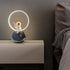 Contemporary Creative Resin Cartoon Astronaut Planet Iron Ring LED Kids Table Lamp For Bedroom